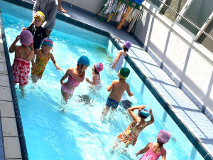 Swimming Coach and Kids